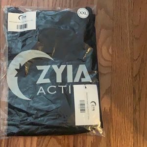 woman’s ZYIA long sleeve BRAND NEW both in package